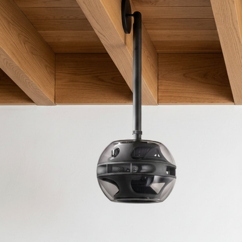 Syng Cell Alpha spatial sound speaker hanging from ceiling